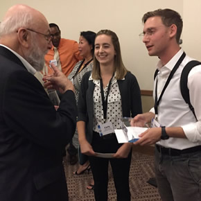 Carly Warren and David Gafni discussing their award with Dr. Marvin Danoff, Past President of the Human Factors and Ergonomics Society.